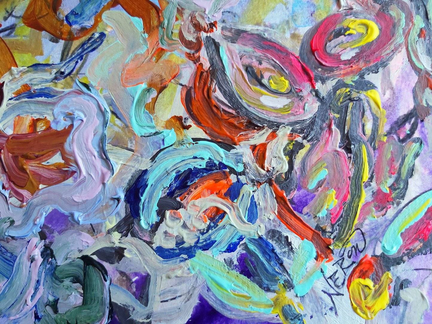 Detail of Audrey Néron’s painting “Rebel Angels” (2022), acrylic and oil on Canson paper, showing bold strokes of orange, blue, pink, and yellow swirling together in dynamic abstract forms, highlighting texture and movement.