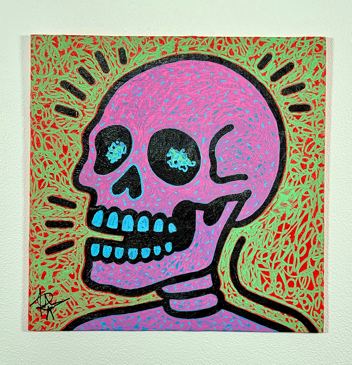 Pop Icon style painting of a pink skull with blue highlights and bold black outlines on a vibrant green patterned background, contemporary acrylic artwork by Audrey Néron.