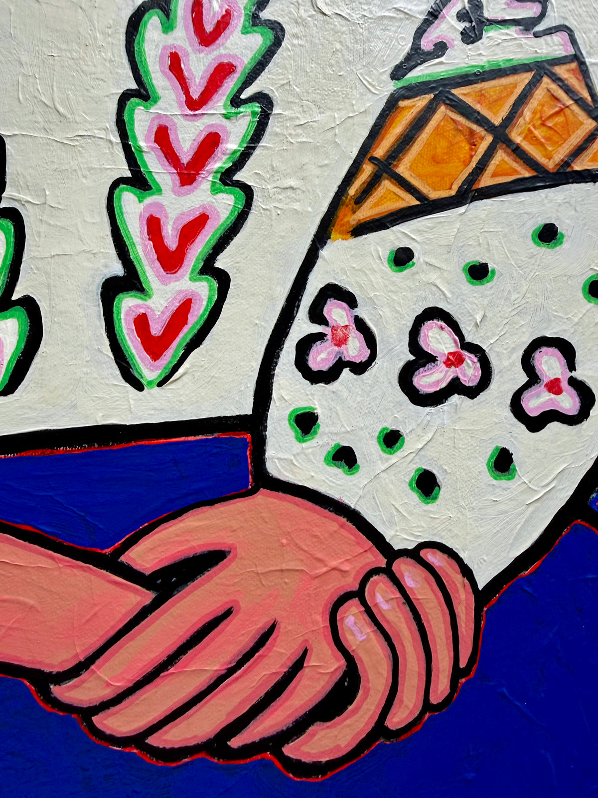 Close-up detail of MAT by Audrey Néron, showing the painted hands, floral motifs and textured surface of the original Pop Relic artwork.
