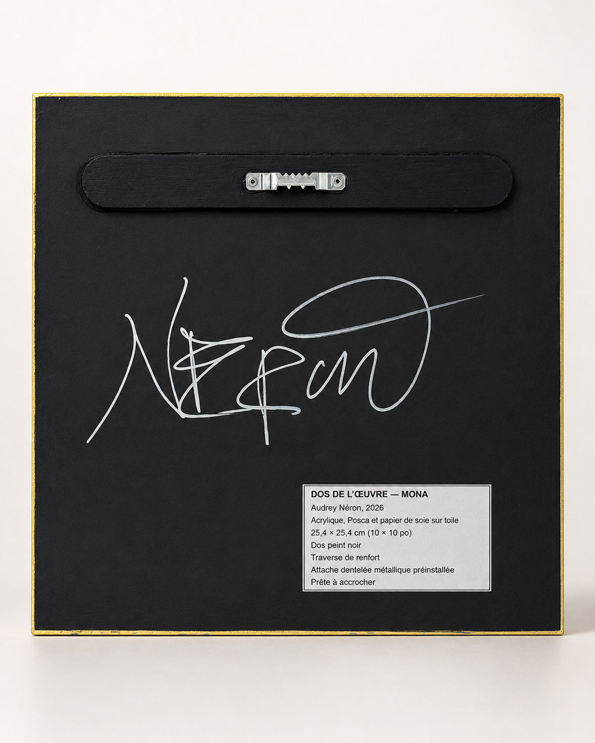 Back of MAG (2026) by Audrey Néron, showing signature and installed hanging hardware.